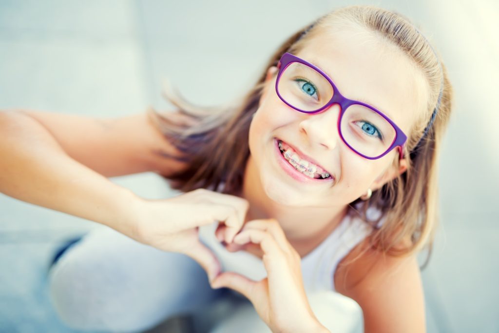 girl with glasses and braces